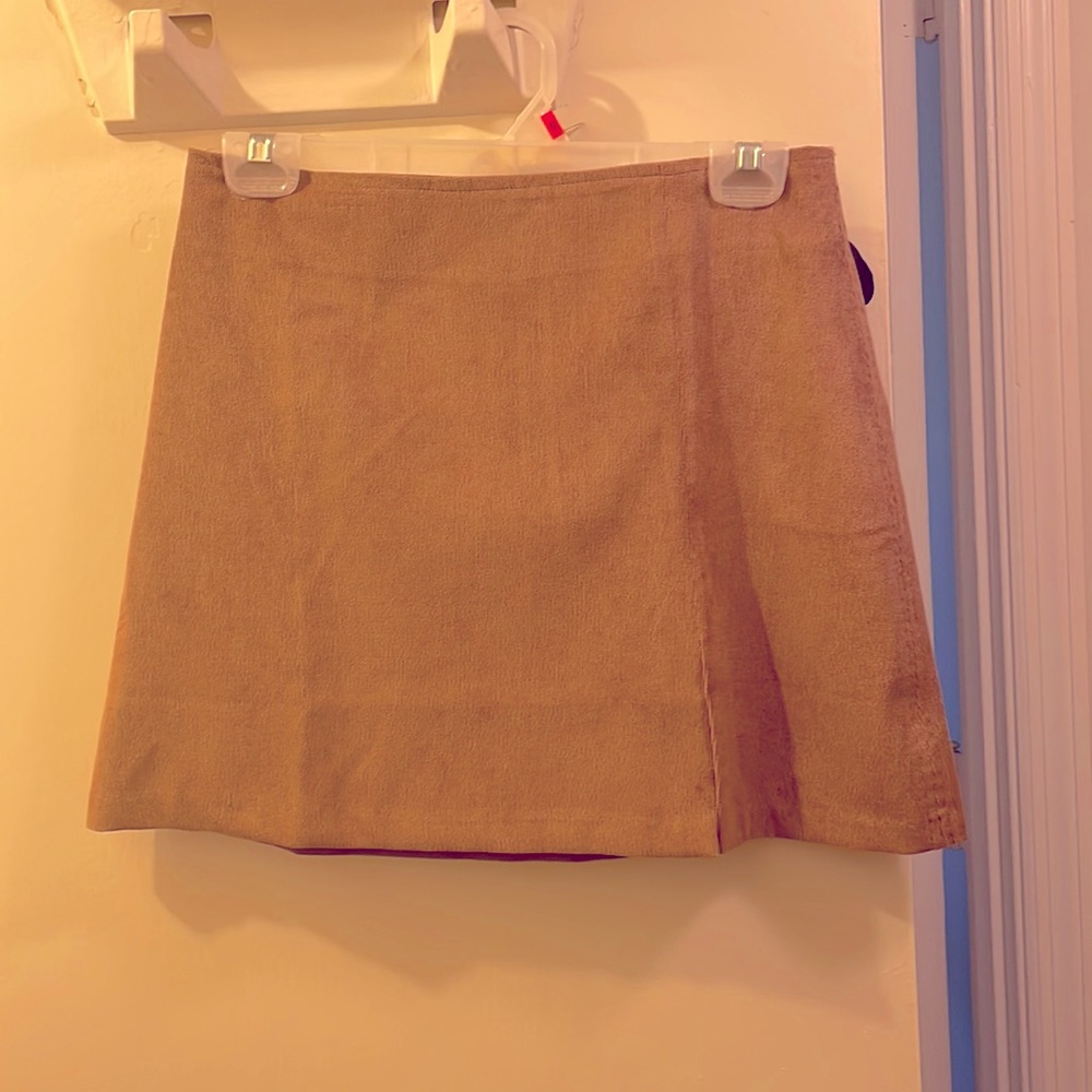 Adorable tan thin corduroy mini skirt with ring zip back